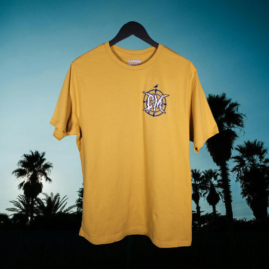 Yellow t-shirt with a white beach logo on a  a dark blue sky with palm trees