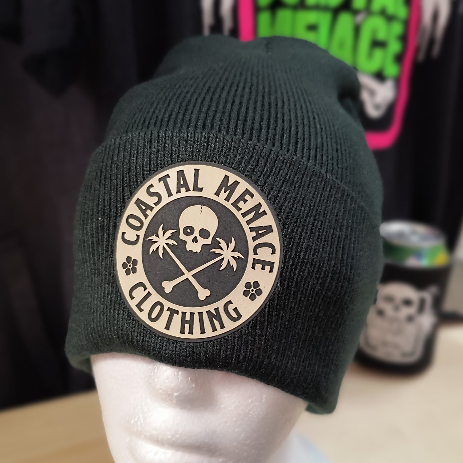Coastal Menace Base Threat beanie in black with skull and palms patch