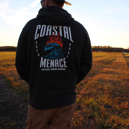 Back view of the Hot Breaker charcoal zip hoodie worn by male model at sunset.