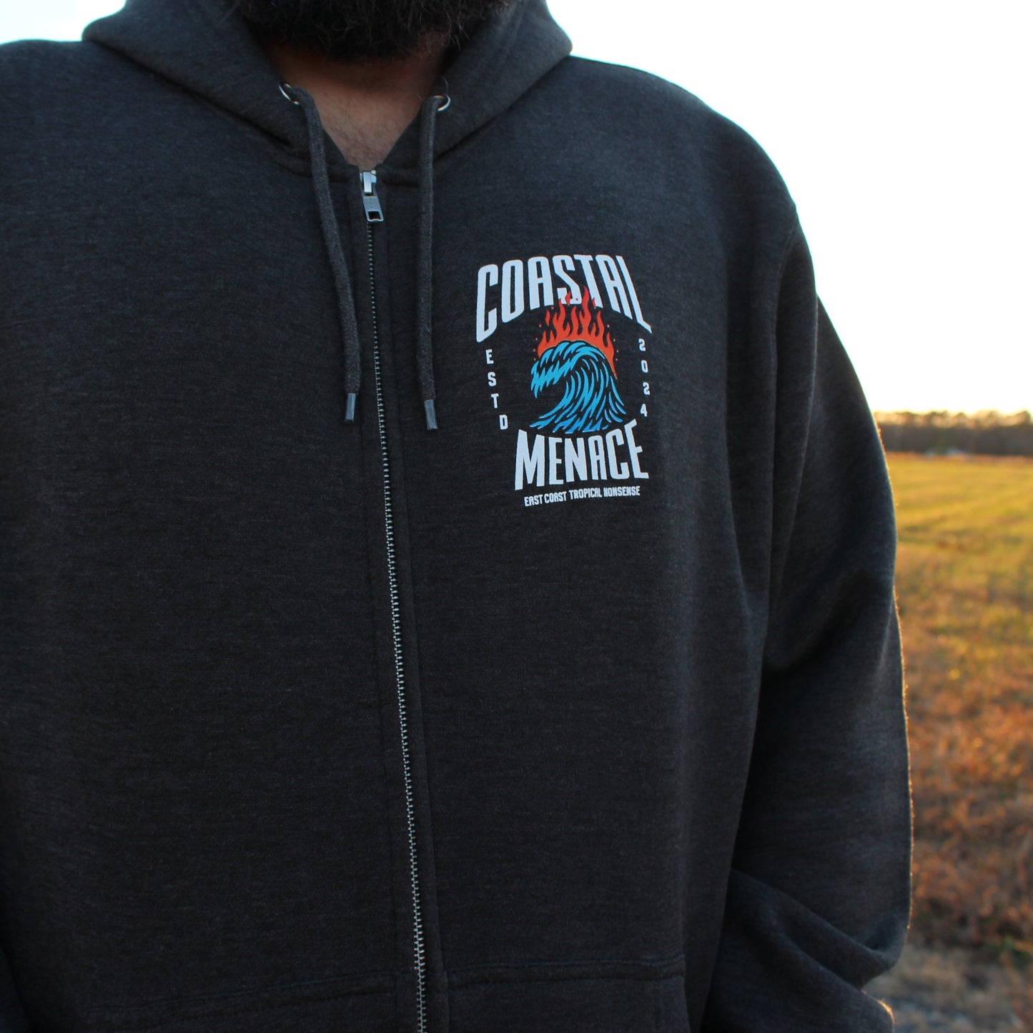 Front view of the Hot Breaker charcoal zip hoodie worn by male model.