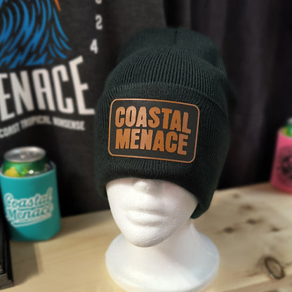 black knit beanie with brown OG Coastal Menace patch on the front