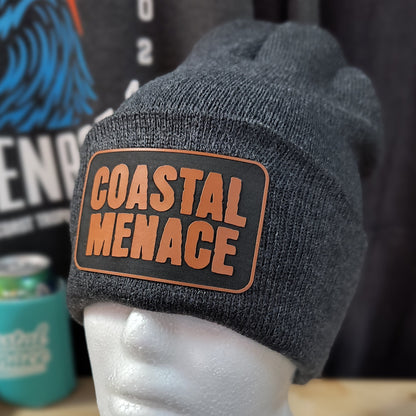 front view of heather grey Coastal Menace beanie with rectangular logo patch