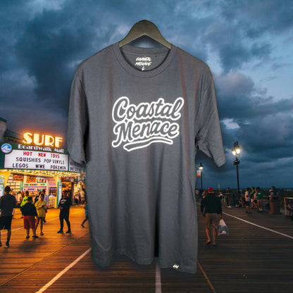 Coastal Menace navy t-shirt with white retro script logo printed on the front